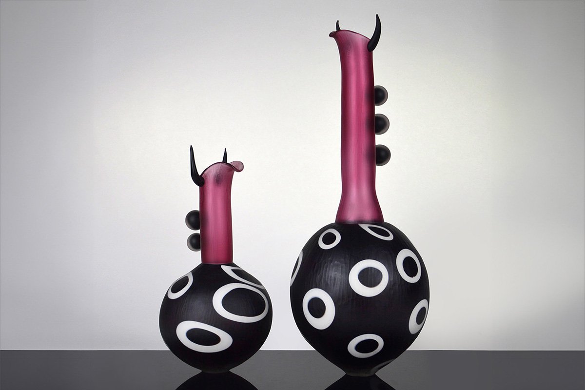 glass pouring vases, a glass sculpture by Theo Brooks
