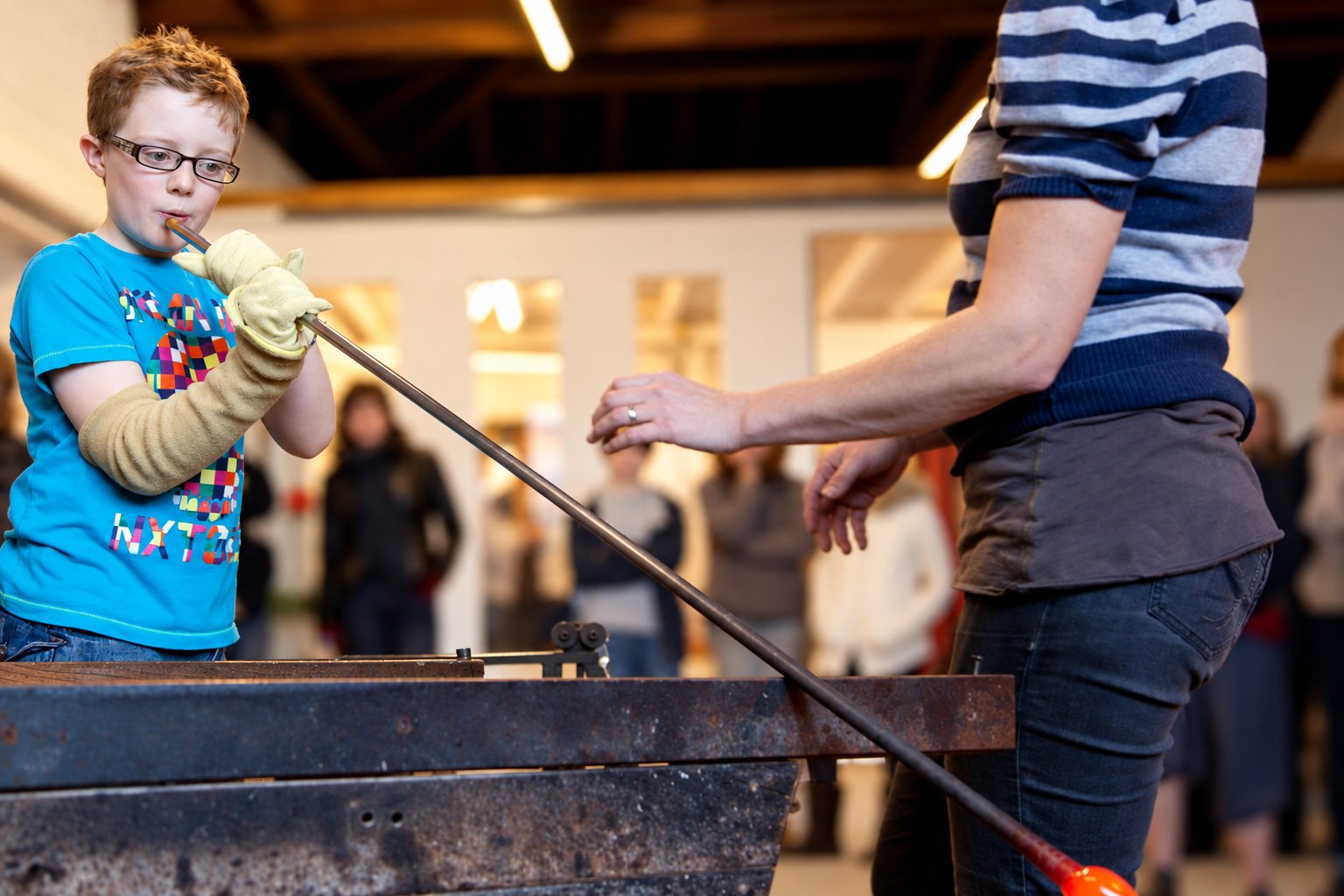 family glassblowing pumpkins for halloween