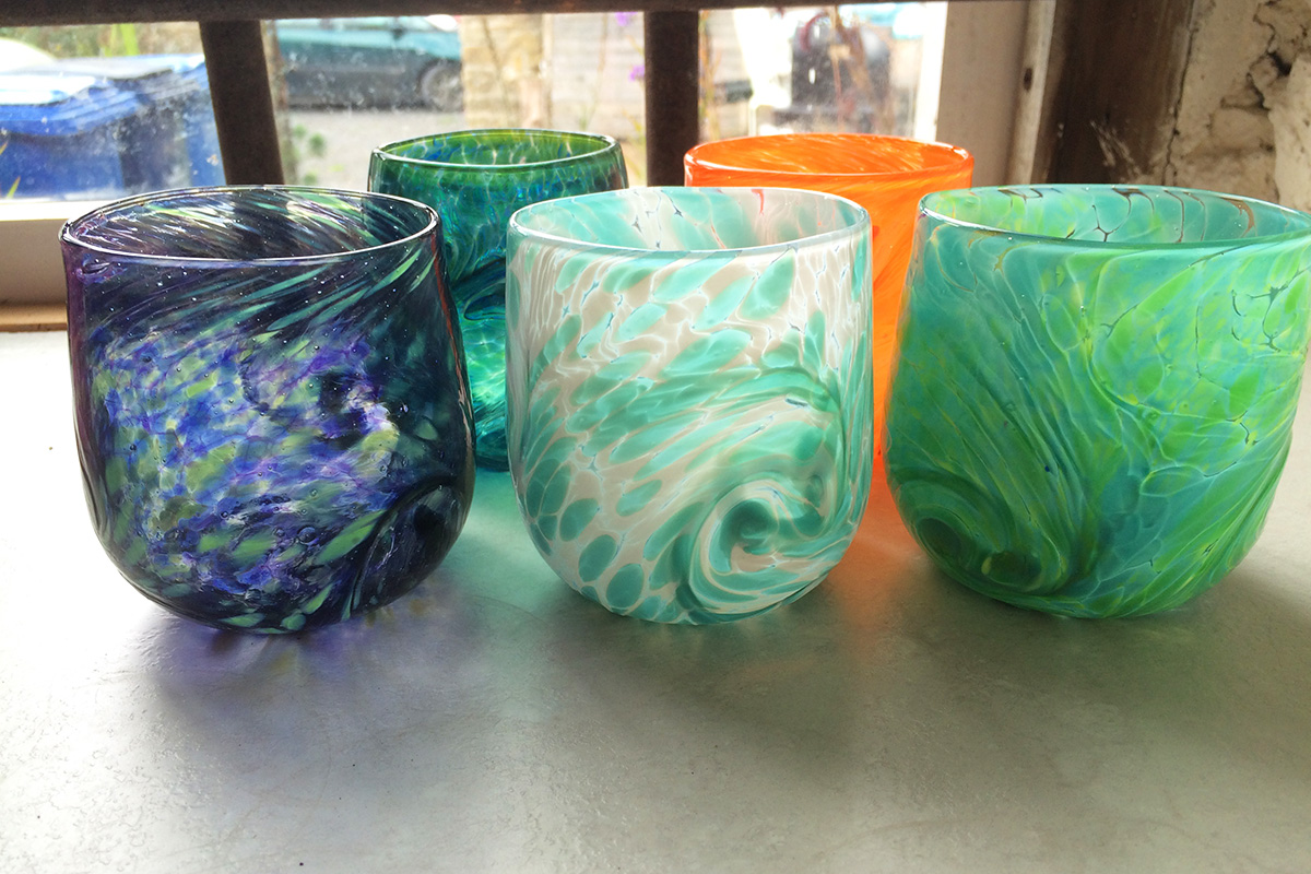 Glass tumblers made on a glassblowing course at the glass hub