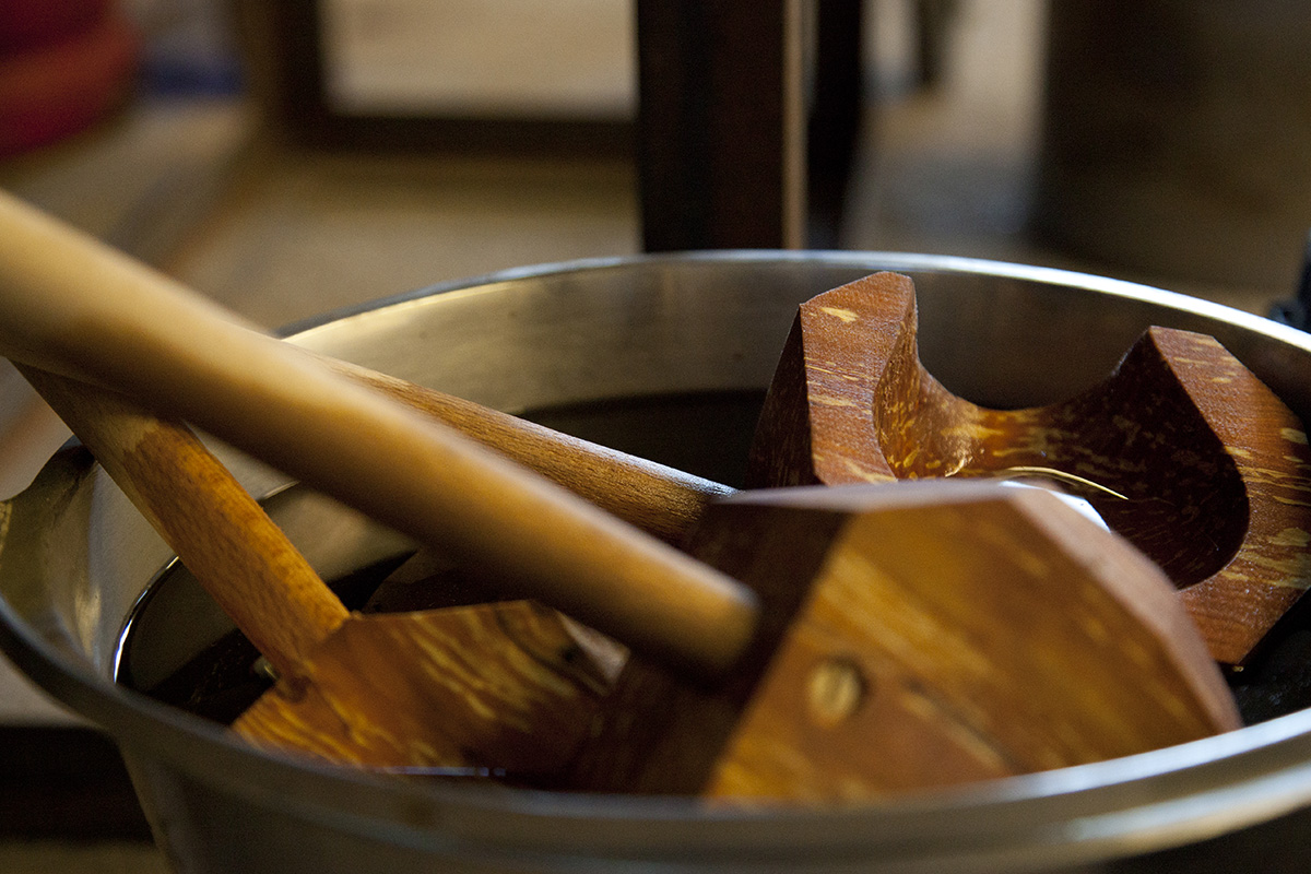 glassblowing tools in steel bucket