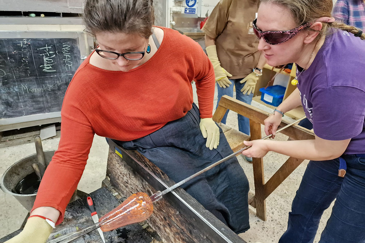 glassblowing experience, student learning to blow glass