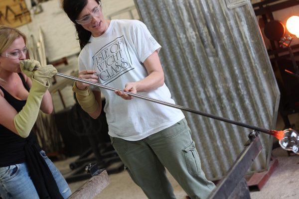 learning to blow glass on a course at the glass hub